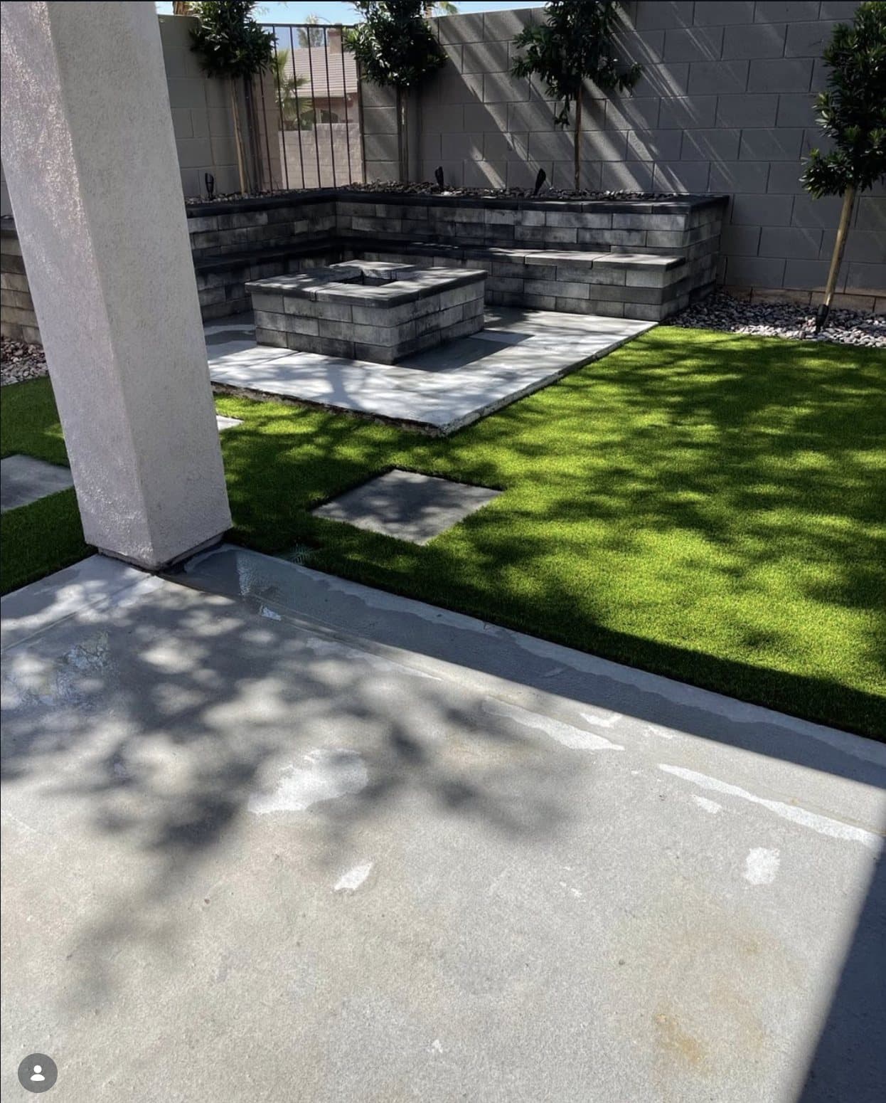 Paver patio with stone fireplace